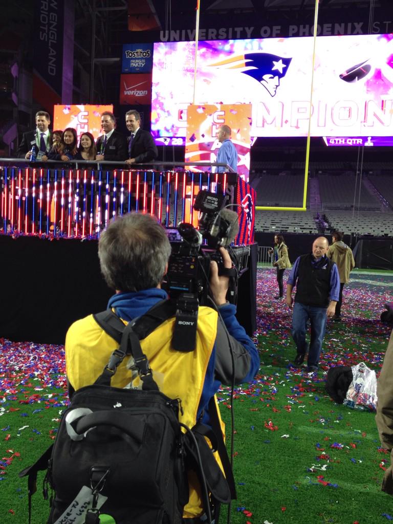TVTEDDY's tweet photo. .@WCSHSPORTSGUY going live from the podium where the Pats were given the Lombardi Trophy!
#1morefor4 http://t.co/TyBw5fEZ7W
