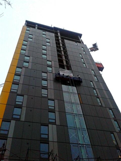 DaGr8Brendinni's tweet photo. #Pic43 @MorrowEquipment @LH_Construction @JobSitePics Installing windows today in a post #XLIX loss and rain. http://t.co/hoajmsYqTl