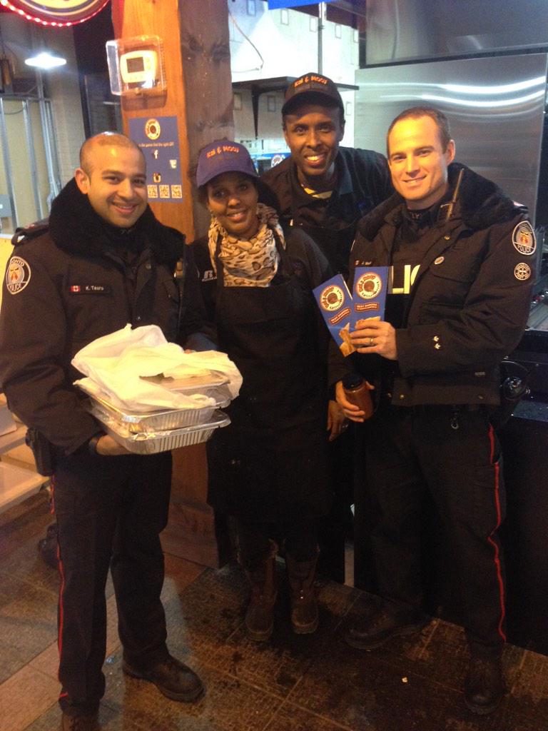 TPS_SSgtWeeks's tweet photo. Celebrating Toronto's diverse food & culture. Welcome to #QueenWest @KalandMooy #bestsamosas @TPS52 w/ @TPSTauro http://t.co/O3mDRu9a0g