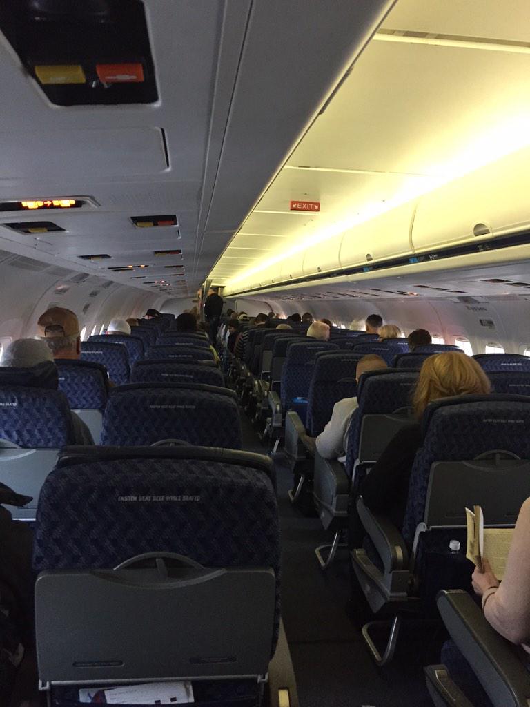 pharmacytim's tweet photo. Stranded in PHX because "no seats available" after #usairways cancellations. Thanks One World. Sure looks full... http://t.co/TswyFtUJCx