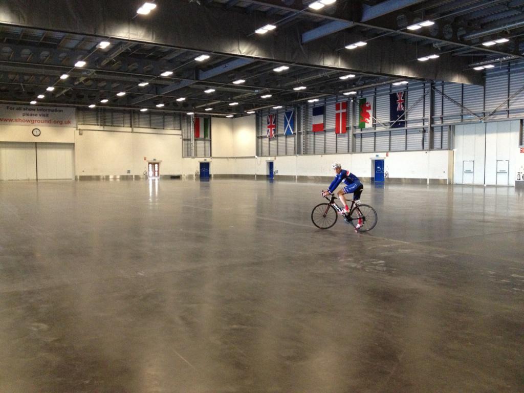 thetourofcambs's tweet image. Event director Malcolm in the @PeterboroArena where the TT will start. A surface with more grip will be laid for it!