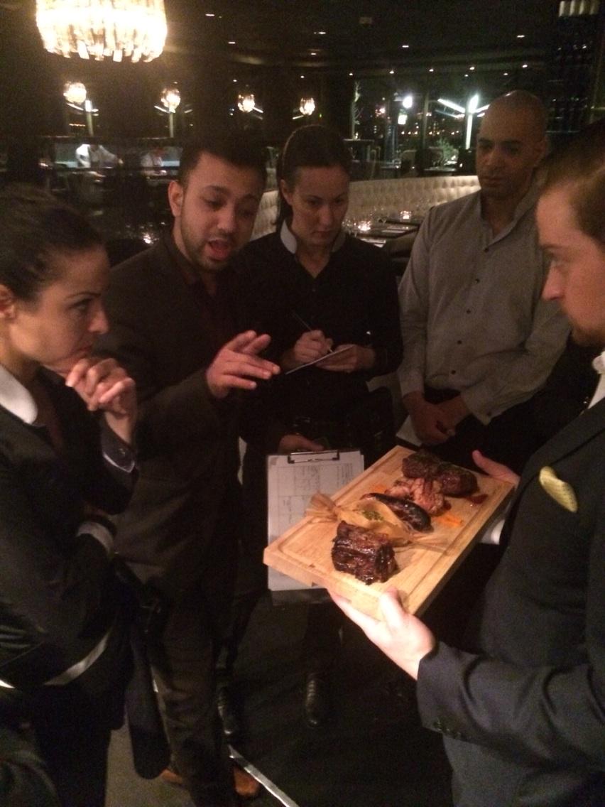 GauchoTravis's tweet photo. Akthar leading brief @GauchoCanary explaining the Gaucho 21st Birthday main course to share #foodporn @gauchogroup http://t.co/rHkJWvOlig