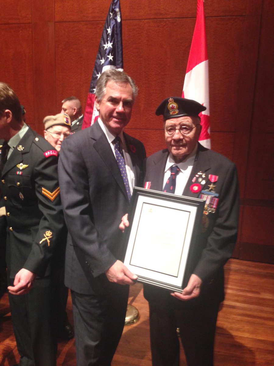 JimPrentice's tweet photo. Honouring surviving members of the #DevilsBrigade. On behalf of Alberta, thank you Mr. Leonard Corbett of #yyc http://t.co/9UFGylC32S