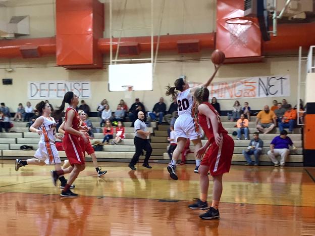 Varsity Girls in action tonight!  Great fast break layup against Lone Oak in the first half. #LadyCats