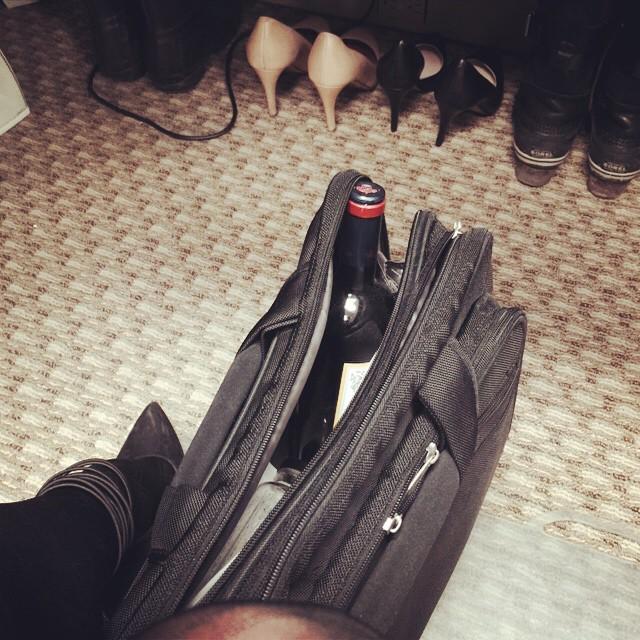 E8S25G81's tweet image. Found a bottle of wine I had forgotten about in my computer/wine bag. #winebag #whatisacomputer by ashligo