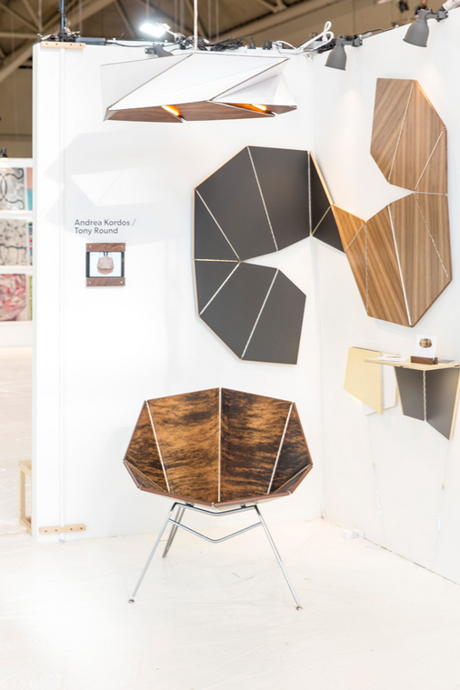 torontolife's tweet photo. What's at the Interior Design Show, like this origami chair (that's it unfolded on the wall): http://t.co/zCuPWUVSTW http://t.co/8LC020INkI