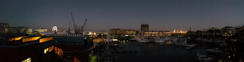NickiLinde's tweet photo. RT @onanotherplane: Not a bad view for a Friday night - the V&amp;A from our room @OOCapetown http://t.co/WTNr42xIQV