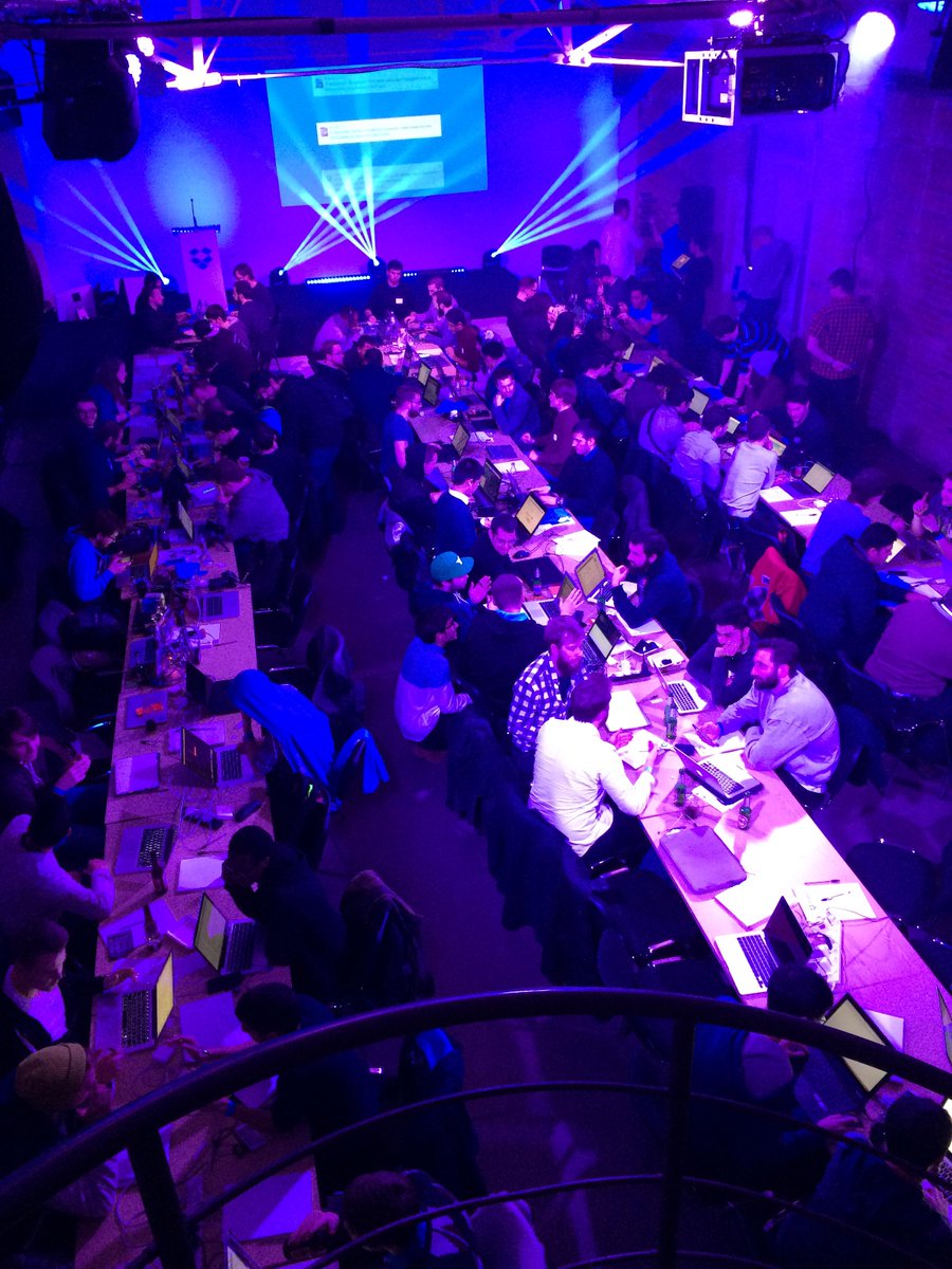 dropboxapi's tweet photo. Our London hackathon is winding down for tonight. Here's a great overhead shot of the crowd from today! #dbxhackathon http://t.co/MLpPxz43Cq