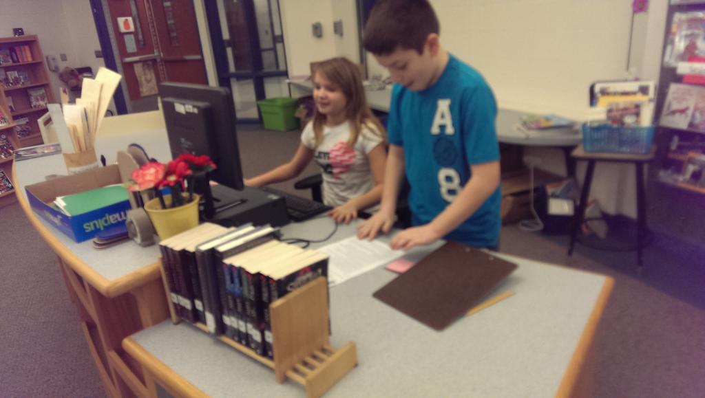 MISRiz5's tweet photo. Deciphering clues, searching the nonfiction section and looking for call numbers to crack the code! http://t.co/P2W1TumQXh