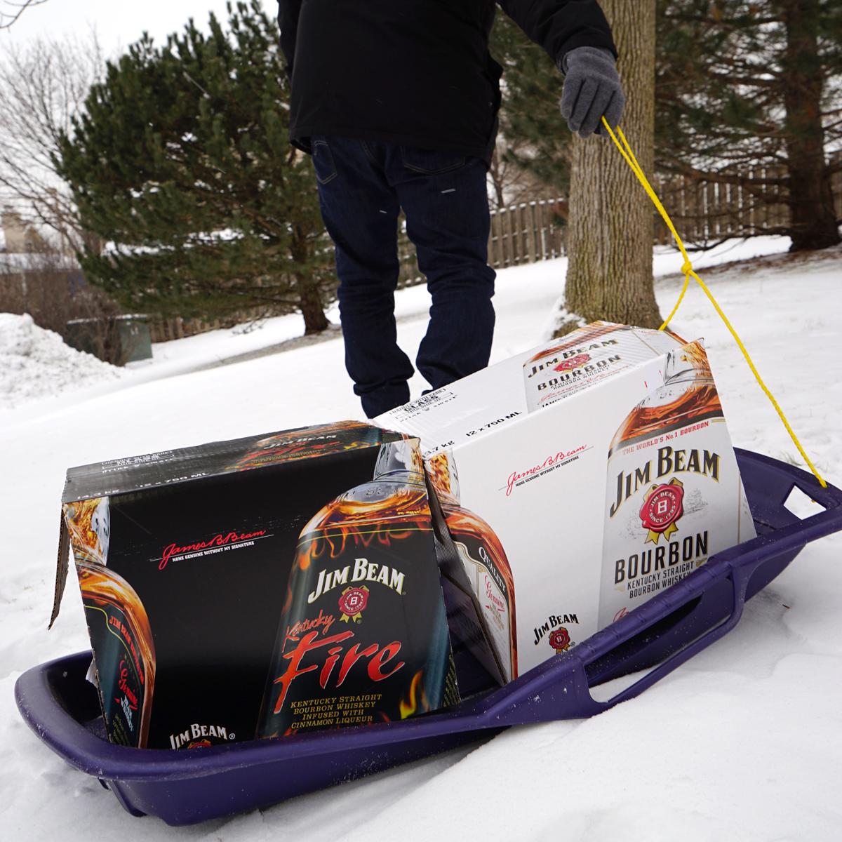 ReneJVega's tweet photo. Totally not my photo but @JimBeam #productplacement in #NYC #Snowmageddon2015 #SledDelivery http://t.co/vvuJmsrVyv