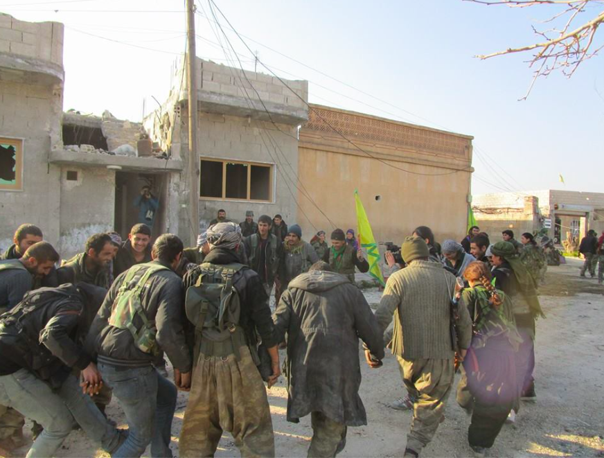 FredericHelbert's tweet photo. Victory danse of #Kobane #Warriors. I did not believe when I was there it could have been possible. #KURDS made it! http://t.co/ckOu0x8lLk