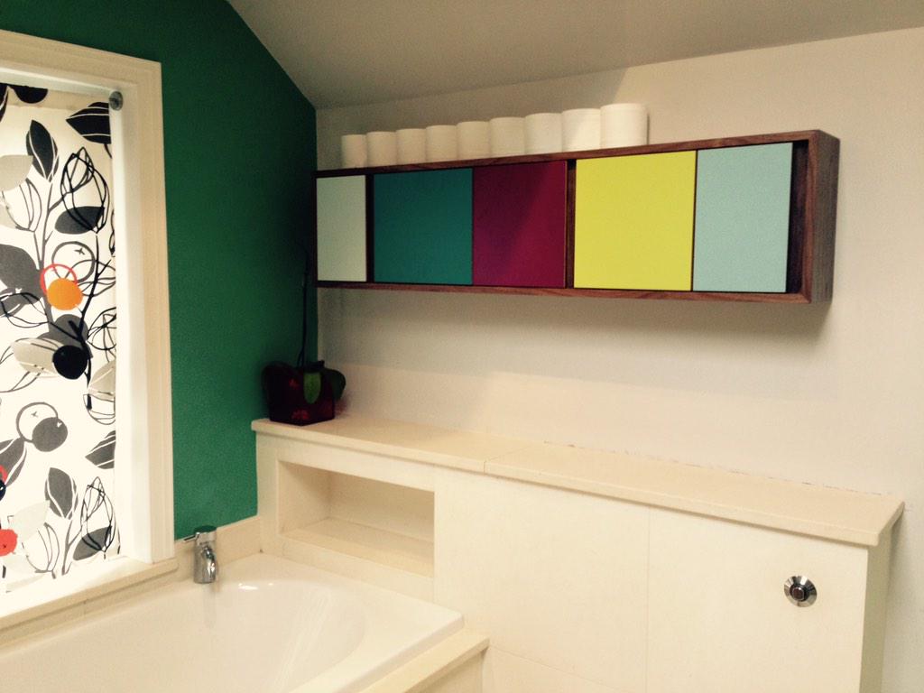 Spacecady's tweet photo. Colourful medicine cabinet, walnut and Formica,
@FormicaGroupEU #madewithformica the hero for me is the Bermuda door http://t.co/feSt4MJrao