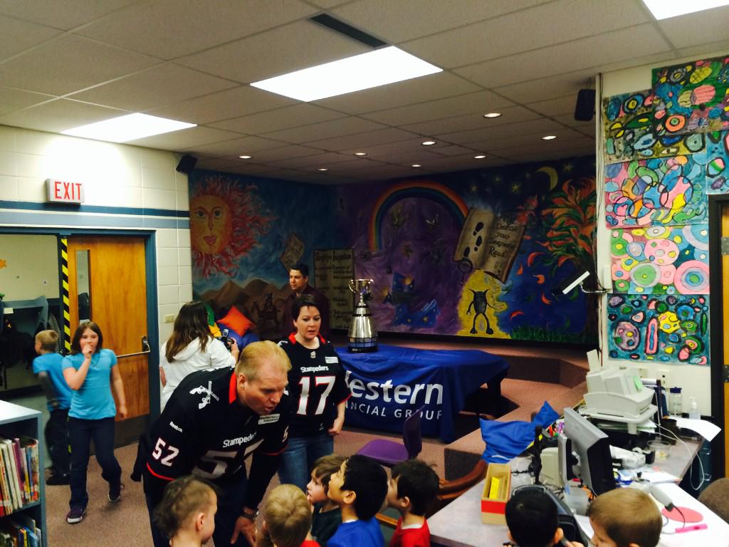 Students at <a href="/EJCSchool/">Joe Clark School</a> in High River getting a chance to see and touch the Grey Cup!