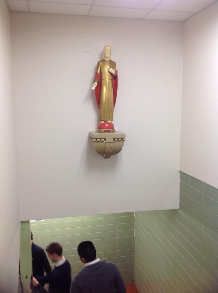 A statue of Jesus on the staircase guidance office #Savior