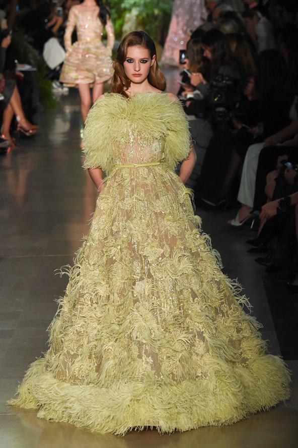 BritishVogue's tweet photo. Feathers, beads, splaying skirts - see the @ElieSaabWorld #HauteCouture show - http://t.co/SBnoRcaZHq http://t.co/MYGEPbCMka