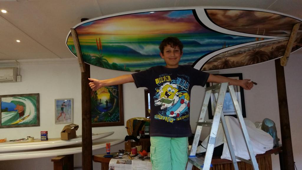 EpicJbay's tweet photo. Hanging out with @africaSUP  and hanging the #epicjbay board over the counter . Fun http://t.co/yEaOoh14dL