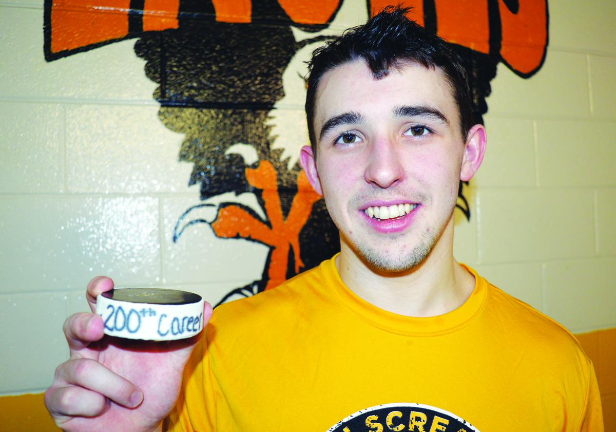 cbpost_sports's tweet photo. .@KyleFarrell9 with his 200th career point puck after Wednesday's game. @CBSEHockey #QMJHL #LHJMQ http://t.co/pAdQvsP5vZ