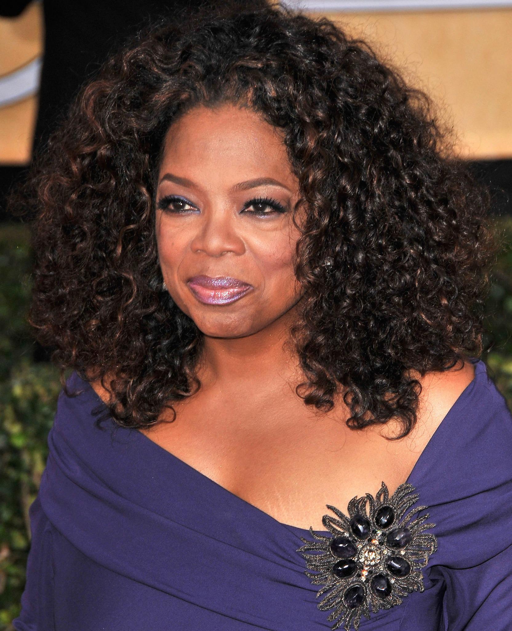 Happy birthday Winfrey blows out 61 candles today  