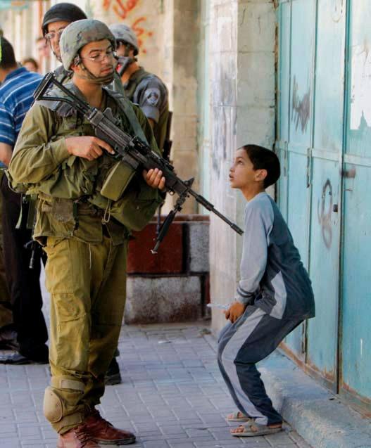 ybenderbal's tweet photo. Lui ne sera jamais appelé "Terroriste". Ce qu'il fait subir aux enfants ne semble pas choquer la #France. #Ahmed8ans http://t.co/kphdl2Nj7M