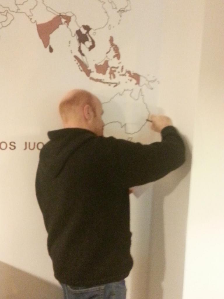The wonderful poet and my friend, Kelvin Fowler, adding New Zealand to a wall in a coffee shop <a href="/f32dream/">Kelvin Fowler</a>