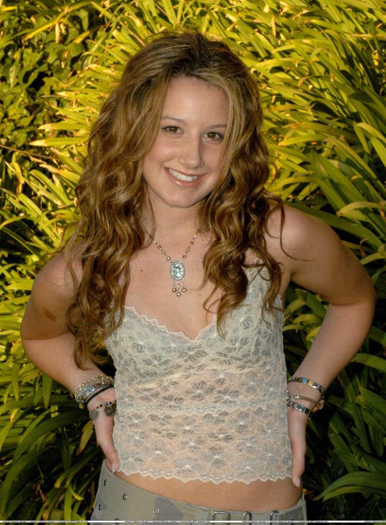 "Throw back Thursday I was about 14 in this picture." Harley smiled as a soft laugh escaped her lips.