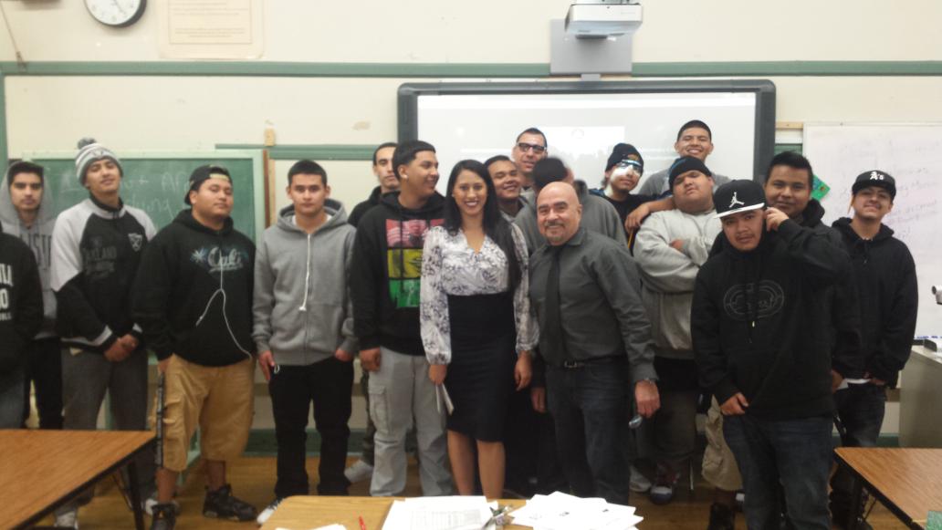Amanda Johnson, Academy of Arts University and Dr. Rivera present college information to Latinos UNIDOS Youth Group.