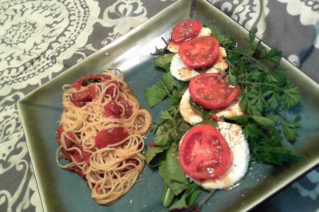 Caprese salad + slow roasted tomato angel hair pasta.I grew all the stuff on ths plate minus the noodles
