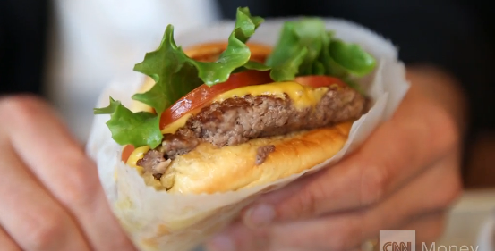 CNN's tweet photo. #ShakeShack's shares surged nearly 120% Friday in their debut on the New York Stock Exchange. http://t.co/xJ4fkX7xwm http://t.co/4DviliLx5X