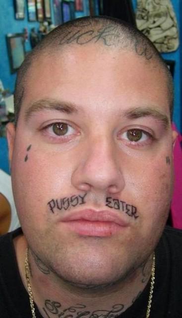 He's really gonna regret that upper-lip tattoo if he ever decides to give up eating pussy