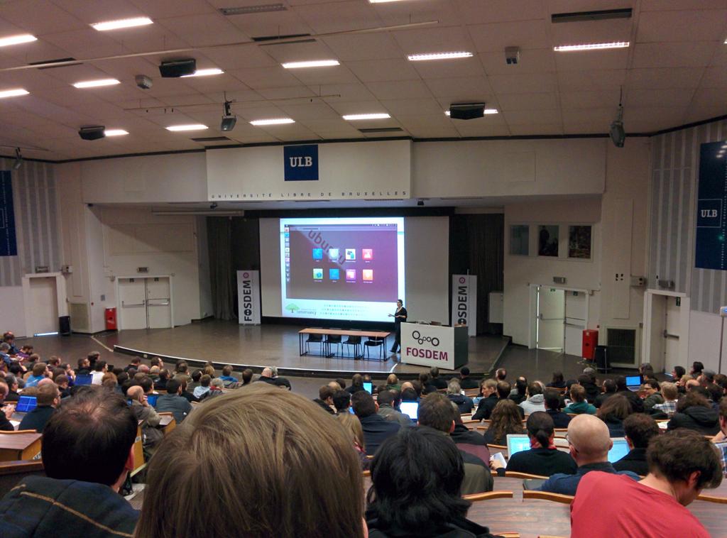 lazypower's tweet image. Unity on stage at #fosdem15