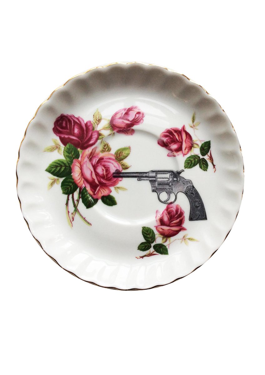 Guns and Roses! Spread flowers in stead of bullets :-)
