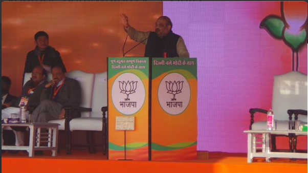 AmitShah's tweet photo. While addressing a rally with PM @narendramodi at CBD Ground, Karkarduma in Delhi today http://t.co/RK96RhrwMM
