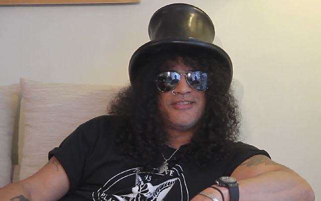 SLASH's Girlfriend Says 'Wackos' Set Off Alarm In Couple's House After Home Was Shown On TV blabbermouth.net/news/slashs-re…