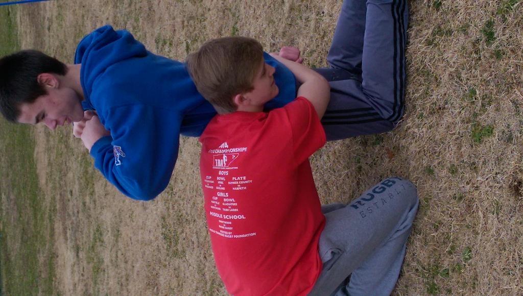 Working on Pete Carroll Hawk Tackling AKA Rugby tackling...wrap squeeze drive -- strike zone hips to knees.