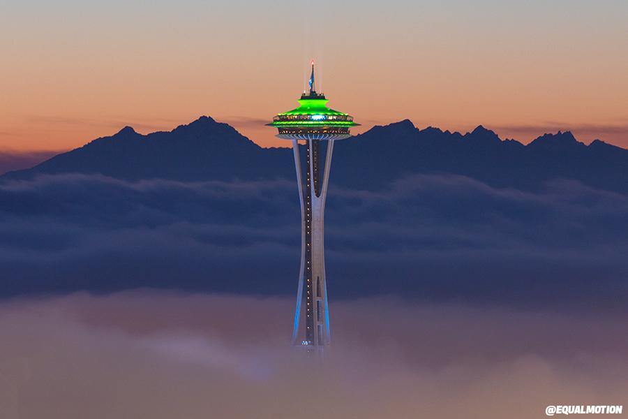 ABC's tweet photo. Mesmerizing view of Seattle's iconic Space Needle soaring above blanket of fog Friday - (PHOTO: @equalmotion) #SB49 http://t.co/3PhPi3WiO8