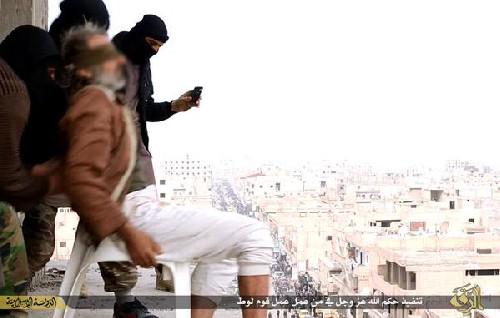 theohreport's tweet photo. ISIS throws accused gay man off building  then stoned him to death http://t.co/p71gjpNAKs #ISIS #terrorism #news #gay http://t.co/tmbPEit948
