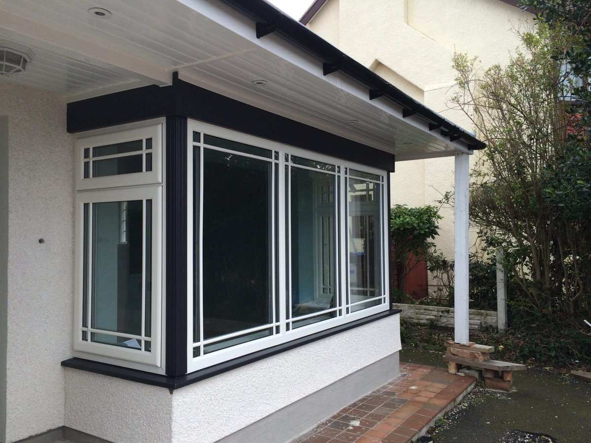 CymruWindows's tweet photo. What a cracking job! White wood grain window​ frames, Anthracite grey cills &amp; posts. @REHAUWindows @ShepleyWindows http://t.co/Yzrpl48hbv