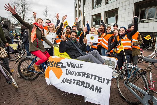 350's tweet photo. Such lively energy from Global Divestment Day in Amsterdam! Here's @kuminaidoo w/ the @FossielvrijNL crew. #divest http://t.co/o9FmkEdI8H