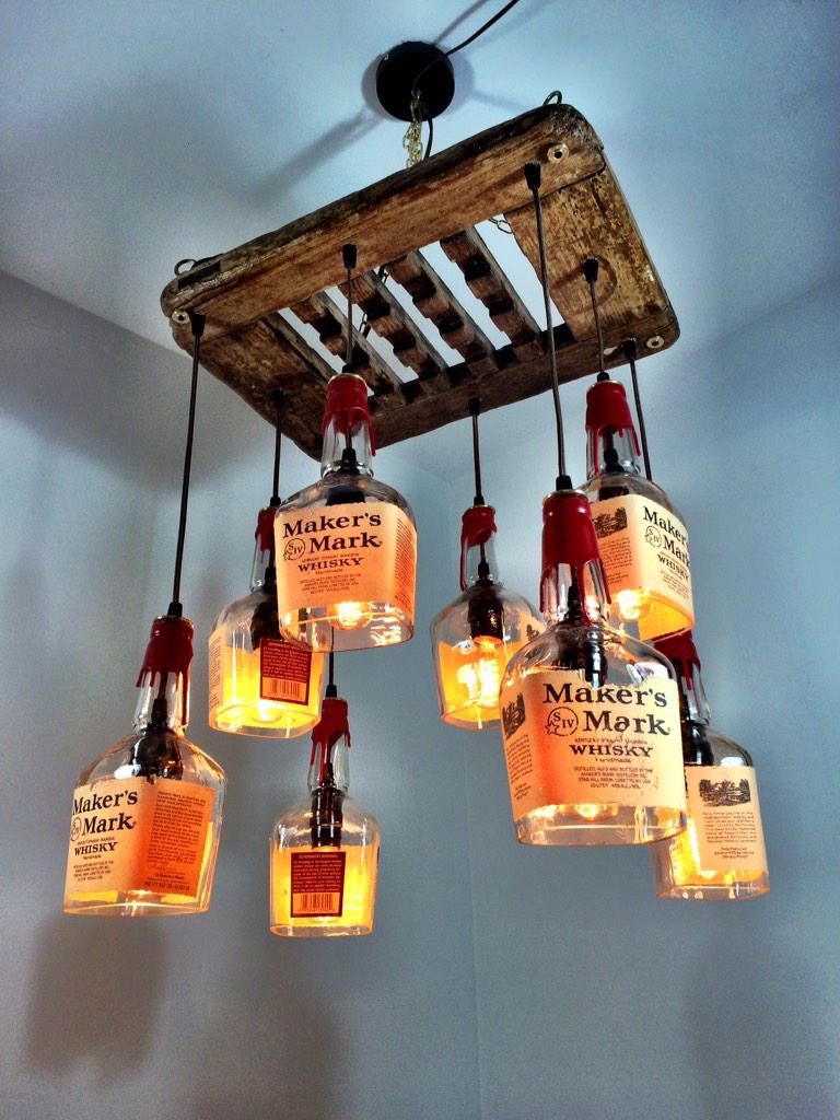 MakersMark's tweet photo. Beautiful! "@PMGlass: 8 @MakersMark Bottles and driftwood chandelier #whiskey #Chandelier #recycle http://t.co/j7Zj8zyRKr"