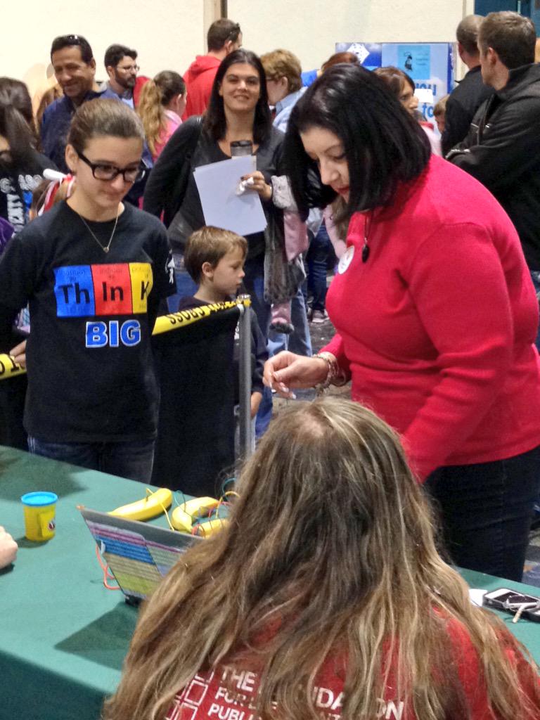 LeeSchoolsEE's tweet photo. @LeeSchoolsSuper taking in a STEM lesson from a student at STEMtastic Day of Discovey. #LeeSTEM http://t.co/05JRbKTg6E