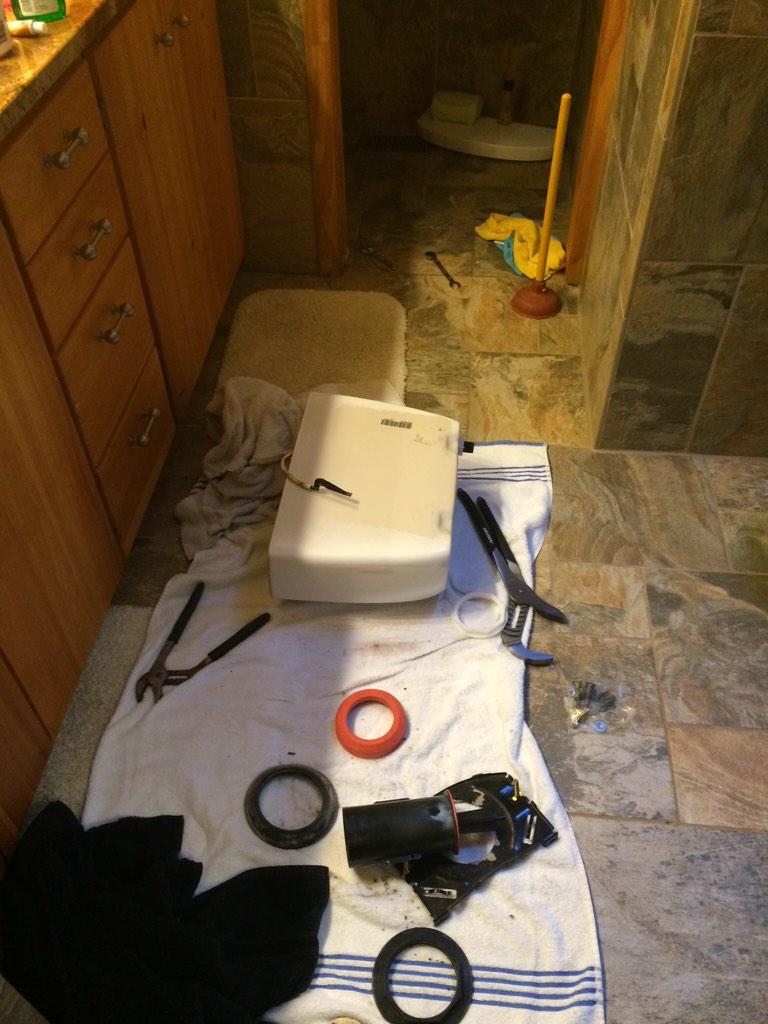 angryjoev's tweet photo. Share your love photos this v-day!  I'm showing love to my toilet which self destructed this morning.  Love n the air http://t.co/Sbk0U1rzMp