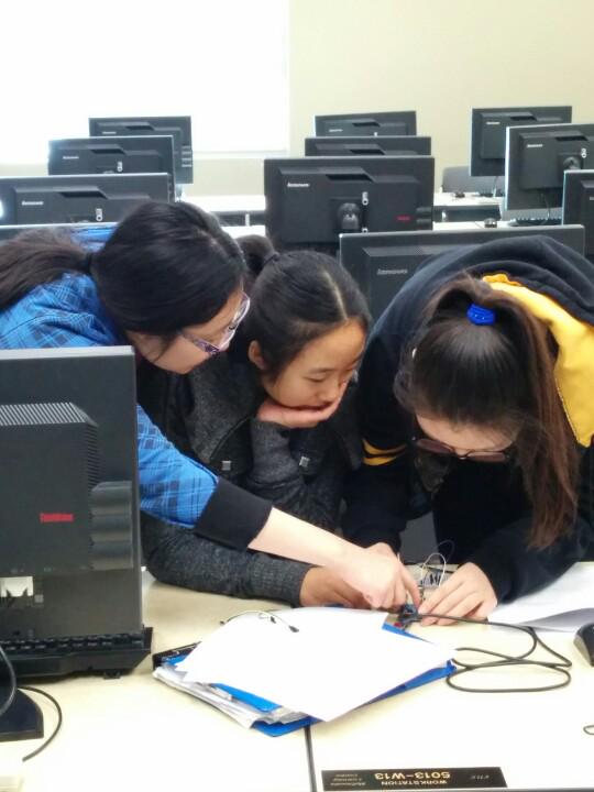 Our competitors configuring an arduino for the Physics portion! #isc2015
