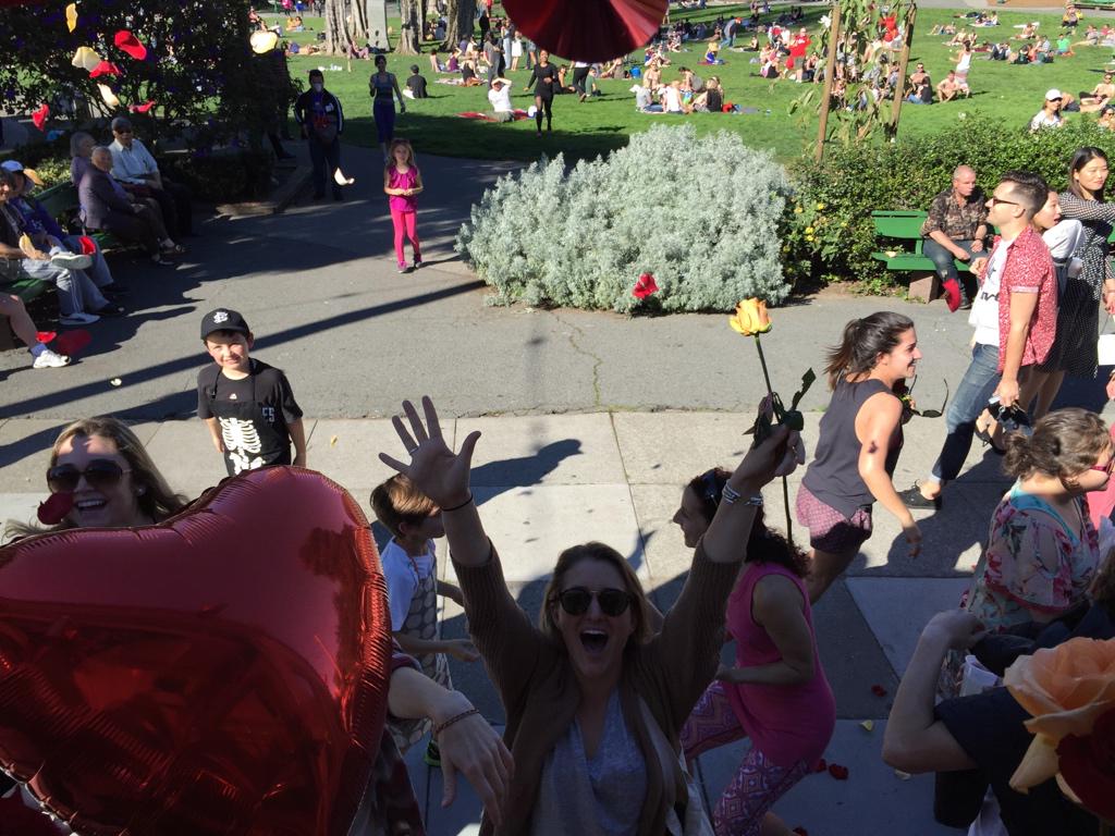 BloomThat's tweet photo. North Beach, throw your hands up if you want blooms!! The #BloomTrain is pulling into into Washington Sq Park NOW!! http://t.co/uoHFxv62wk