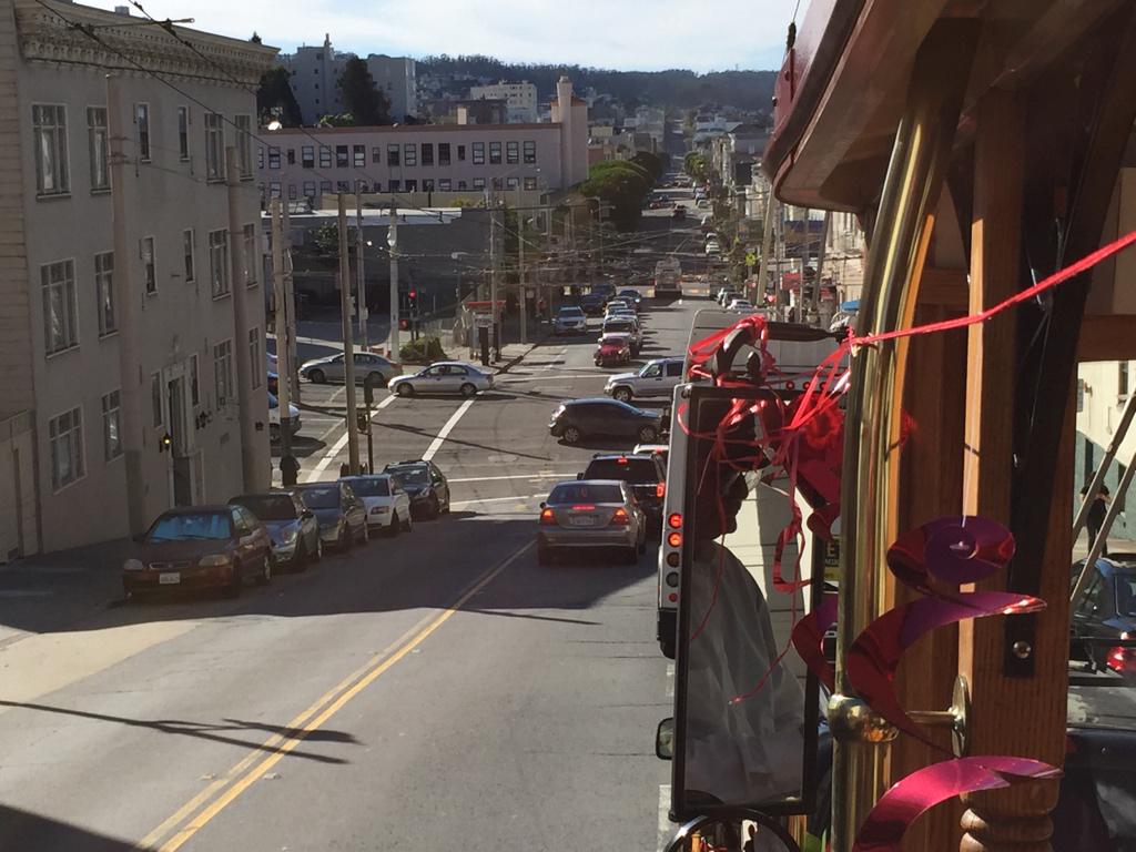 BloomThat's tweet photo. The #BloomTrain is crossing Van Ness into the 94123…get ready Union St… http://t.co/60xKcVcfnu