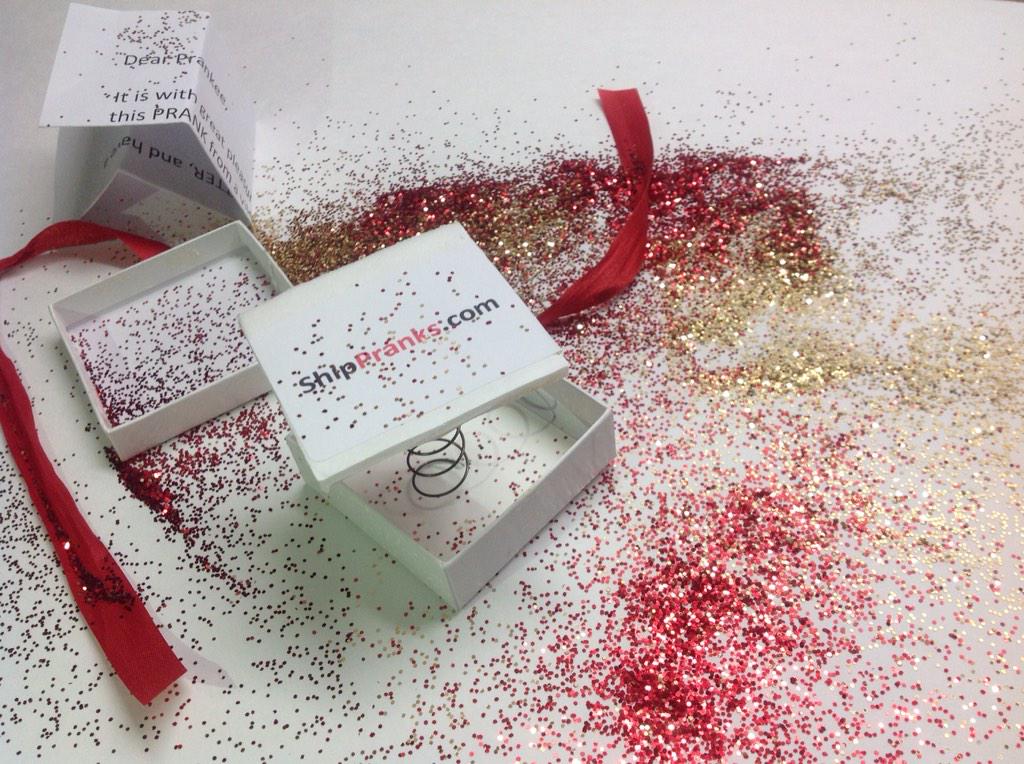 shippranks's tweet photo. "My cubical mate was so excited to receive a gift box... Her face was priceless when it exploded glitter everywhere!" http://t.co/H5s71mRczb