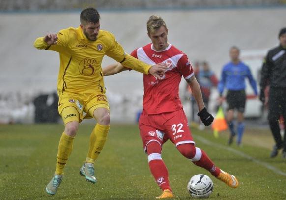 Jakimovski looks to cross the ball Jakimovski looks to cross the ball