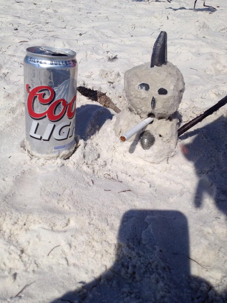 KevinBurnsie's tweet photo. My Florida snowman has a Mohawk. http://t.co/gCwc3yiEoS