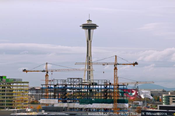 PSBJ's tweet photo. Seattle is under construction. More than 100 projects worth at least $1M each are under way http://t.co/WxImK7JMm5 http://t.co/ahutnzkq1s