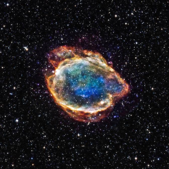 Gizmodo's tweet photo. The remnants of an exploding star is beautiful outer space chaos: http://t.co/1iQFpwVISa http://t.co/IOVsMbZ7y8