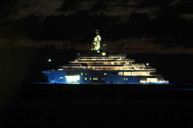 azurehotel's tweet photo. The Eclipse at night behind the Azure. http://t.co/1rLLlMJXw2